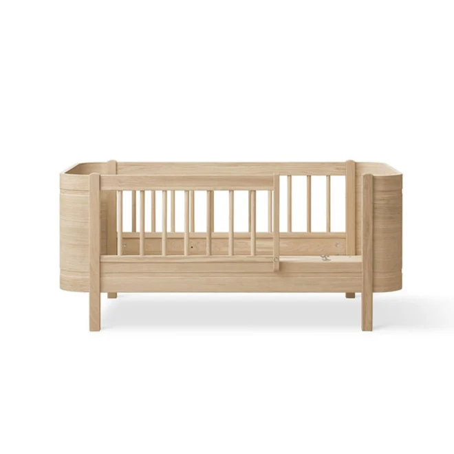 Wood Mini+ Cot Bed Incl. Junior Kit (0-9yrs) - Oak - Image 10
