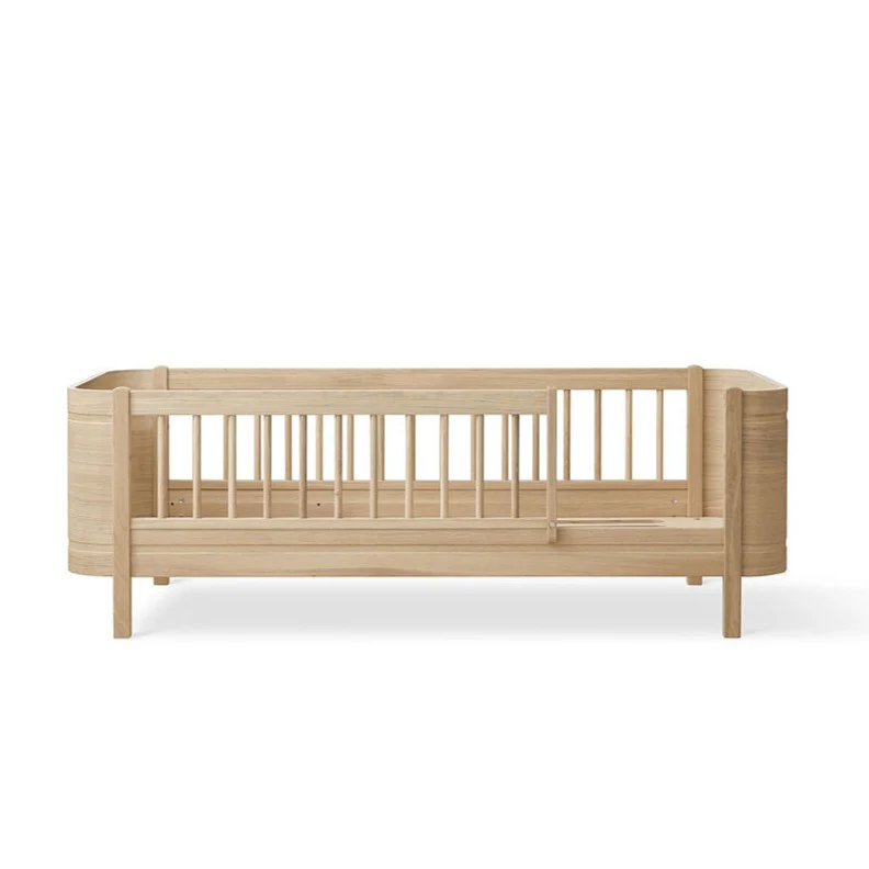 Wood Mini+ Cot Bed Incl. Junior Kit (0-9yrs) - Oak - Image 11