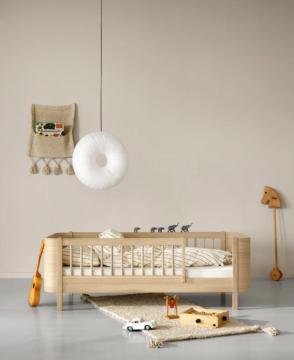 Wood Mini+ Cot Bed Incl. Junior Kit (0-9yrs) - Oak - Image 4