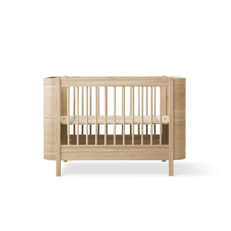 Wood Mini+ Cot Bed Incl. Junior Kit (0-9yrs) - Oak - Image 6